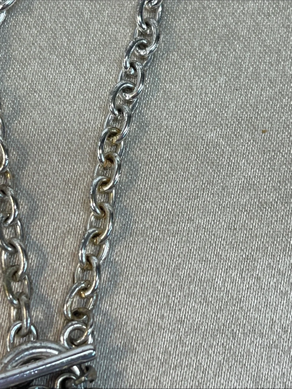 Unknown￼ team pendant